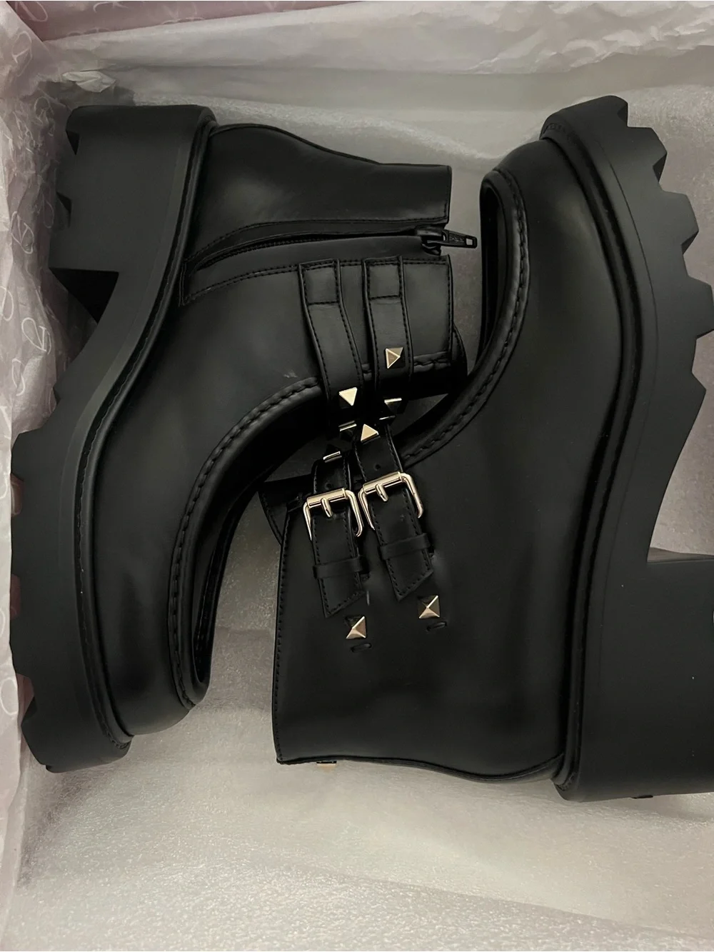 Valentino Garavani Black Leather Lug-Sole Ankle Boots with Studded Double Straps